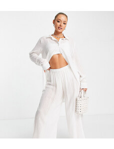 Pantalones de playa blancos a rayas transparentes exclusivos de Esmée