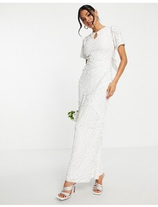 Vestido de novia largo blanco con lazo grande en la espalda y diseño de cuentas de Beauut