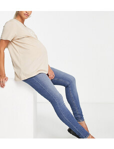 ASOS Maternity Vaqueros azul medio auténtico de corte pitillo con diseño por debajo del vientre Ultimate de ASOS DESIGN Maternity