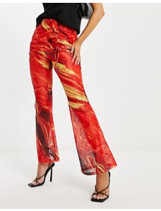 Pantalones multicolores con estampado de lava y detalle superior de falda de encaje de Annorlunda-Naranja