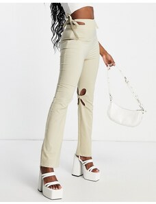 Pantalones de campana color crema de tiro alto con aberturas anudados a la cintura de Zemeta-Beis neutro