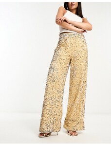 Pantalones dorados de pernera ancha holgada de terciopelo de Extro & Vert