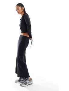 Falda negra con lazada delantera de Mango (parte de un conjunto)-Negro