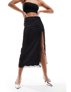 Falda midi negra con abertura delantera de encaje y satén de Mango-Negro