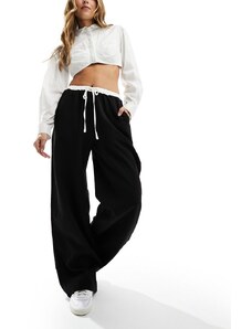 Pantalones negros y blancos de pernera ancha con cintura en contraste de Kaiia-Multicolor