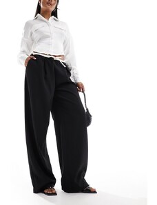 Pantalones de sastre negros y blancos con cordón ajustable de Extro & Vert