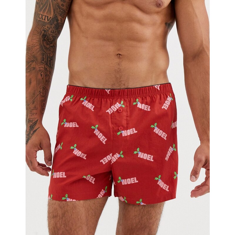 Calzoncillos estilo boxer en tela de navidad en rojo con eslogan de Noel de  ASOS DESIGN 