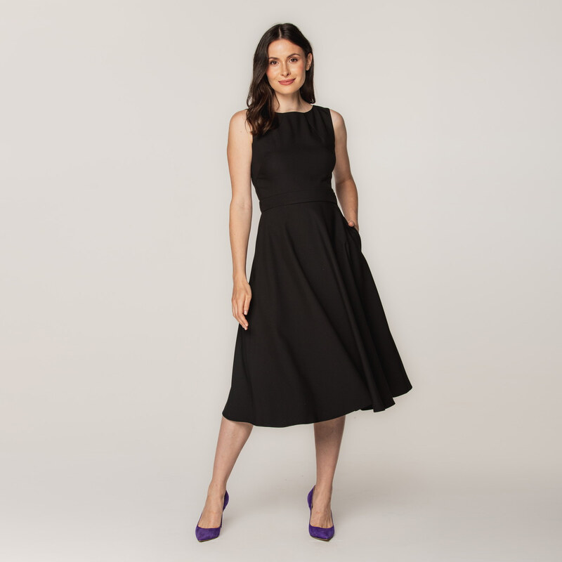 Willsoor Elegante vestido midi para mujer en color negro con estampado liso 15350